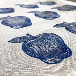 Navy Apple Tea Towel on Oatmeal Linen